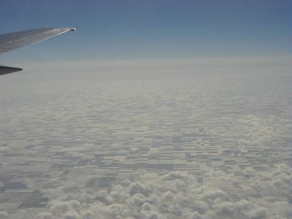 Central United States.  The middle of the USA is the most boring place - dead flat and nothing but farmland as far at the eye can see<br>Location: Over Nebraska (or maybe Colorado)
